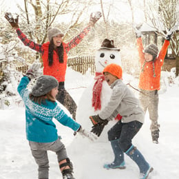 kids and snowman