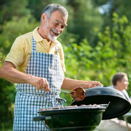 man grilling