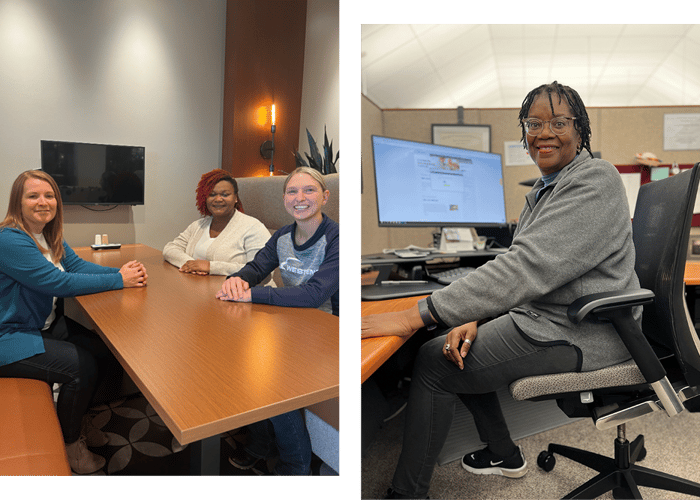 Customer care team sitting around table