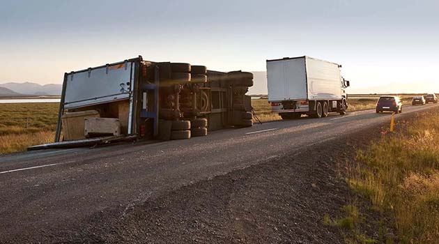 semi-truck-tipped-over-focus-distracted-driving-card-image