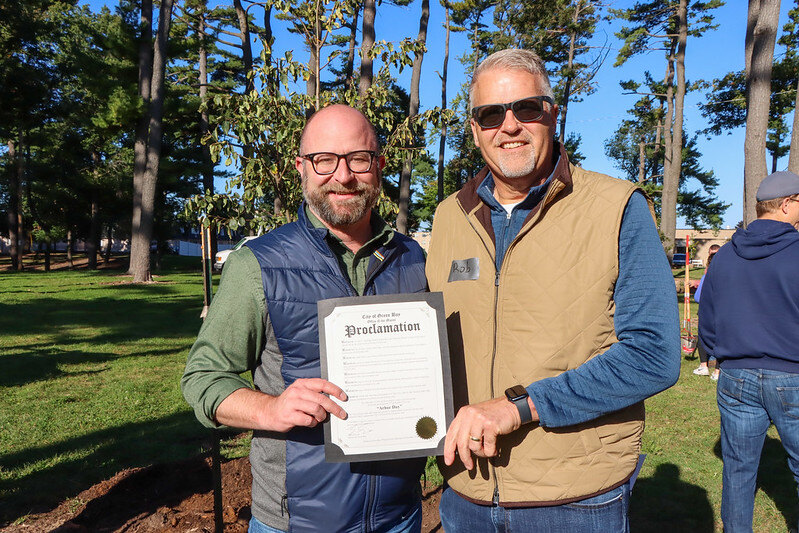 Green Bay Mayor Eric Genrich and West Bend CEO Rob Jacques hold Proclamation.