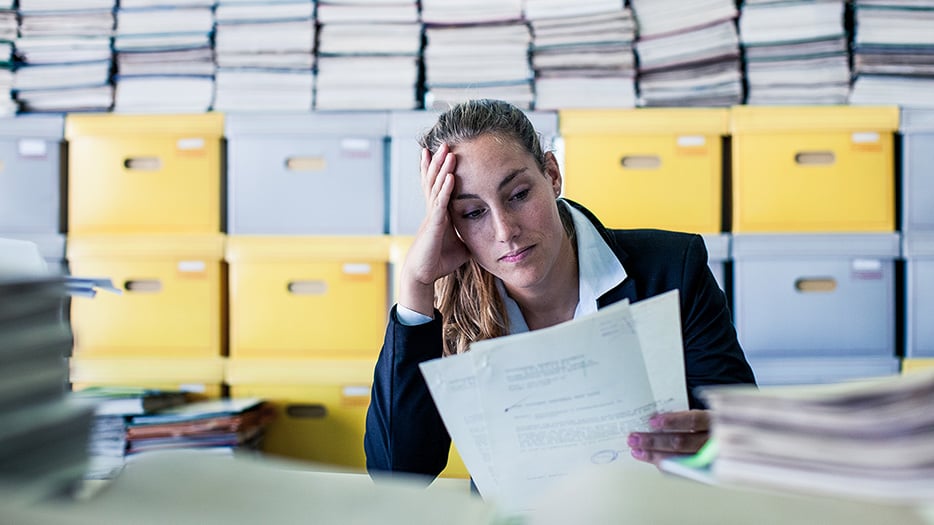 Tired businesswoman in the office