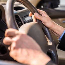 hands-on-steering-wheel.jpg