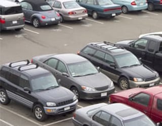 Parking lot filled with cars.