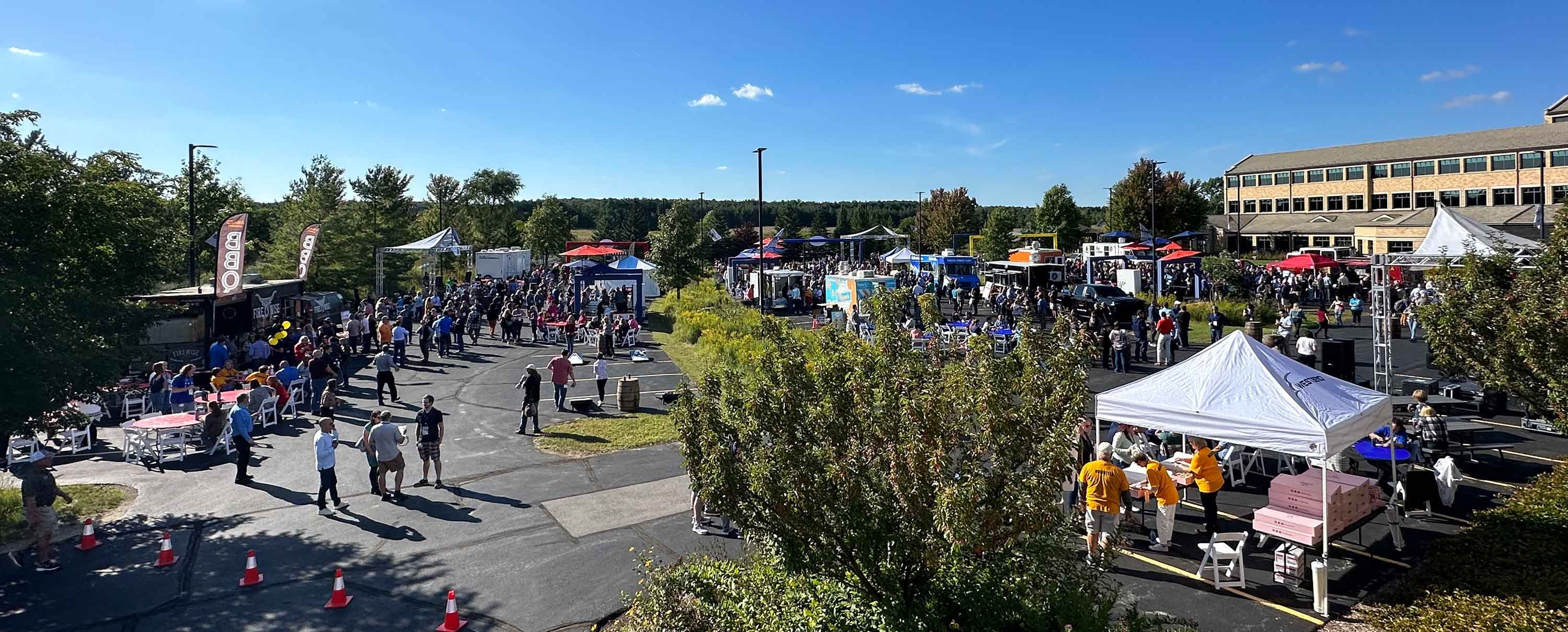 Silver Lining Summit block party in the parking lot of the West Bend campus.