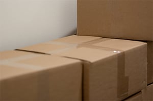 brown cardboard boxes stacked on top of each other.