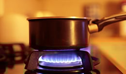 pan sits on top of stove top burner