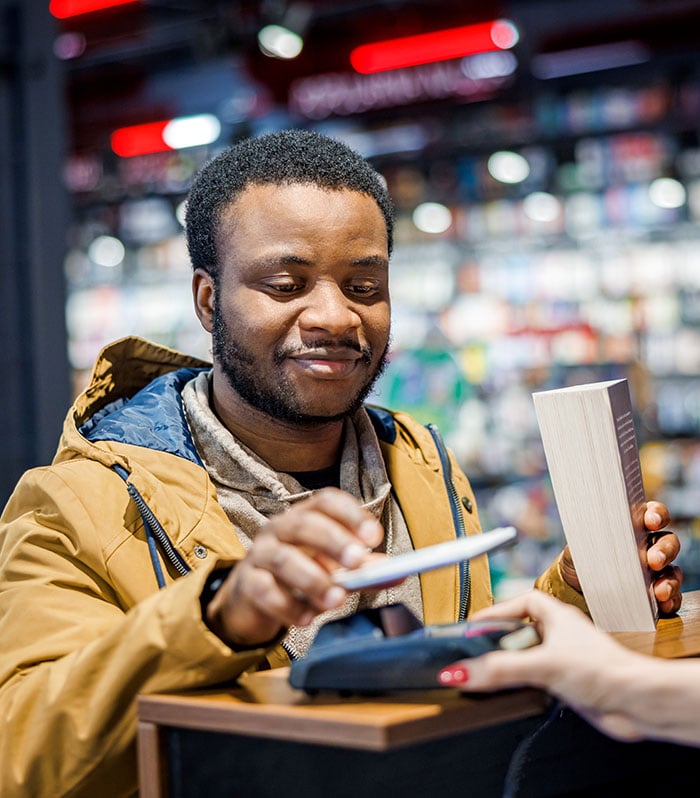 man-making-purchase-with-phone