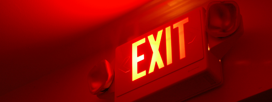 Exit light on a red background